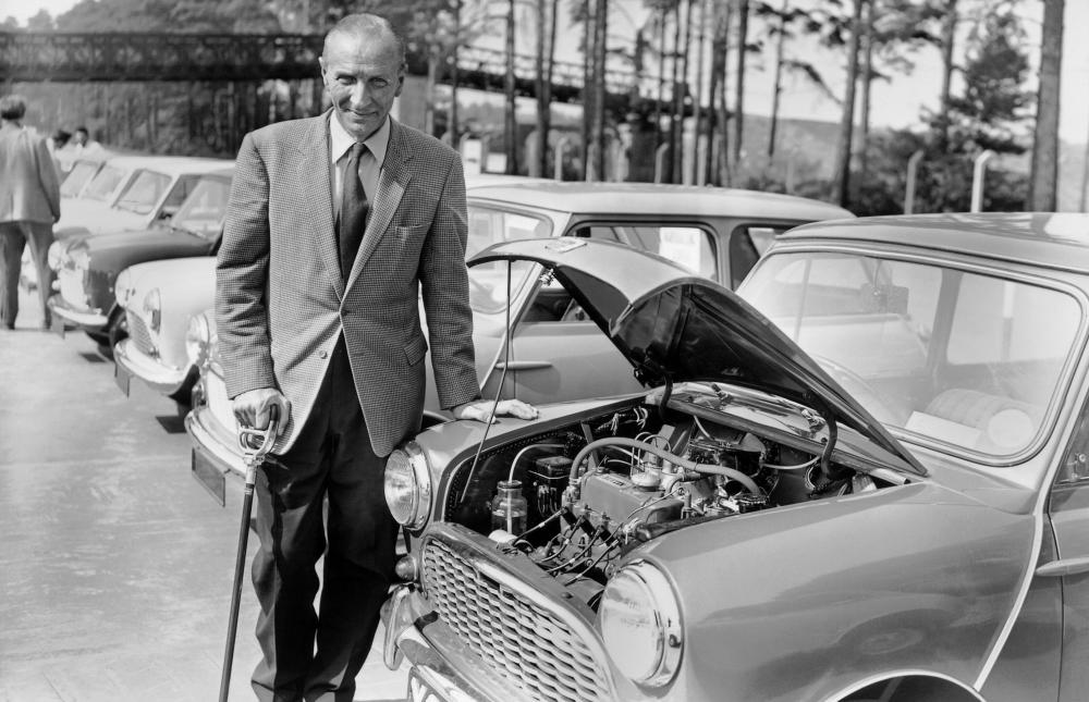 Sir Alec Issigonis with an Austin Seven, also known as the Morris Mini-Minor.