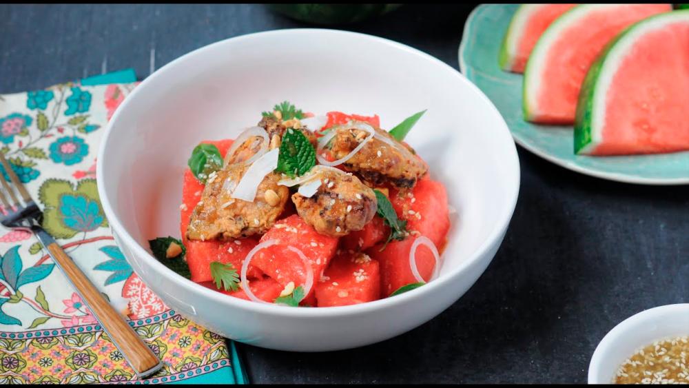 $!Watermelon salad provides a refreshing and hydrating contrast to the fried chicken. – PIC FROM YOUTUBE @ANDREWXIMMERN