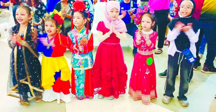 Some of the joyous children dressed in vibrant ethnic costumes at the event. – P. CHANDRA SAGARAN/THESUN