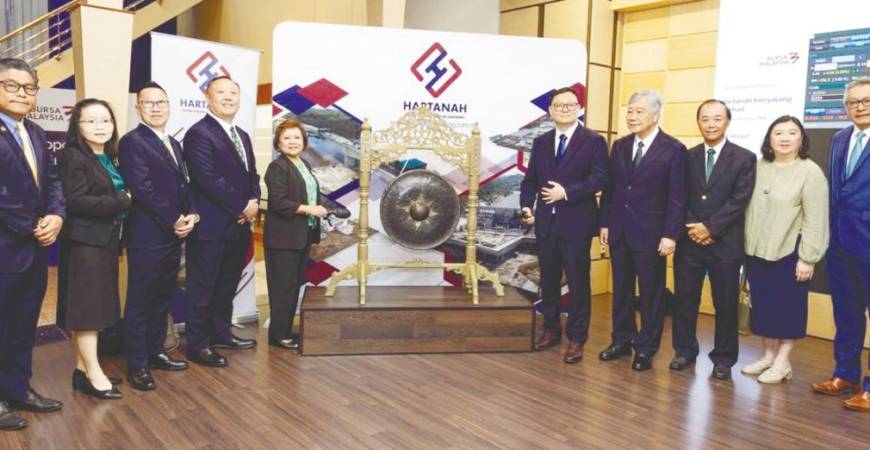 From left TA Securities Holdings corporate finance head Ku Mun Fong; Hartanah Kenyalang independent non-executive director,Chai Suk Phin; executive director cum COO Tony Cheok Liam Fock; Seah Boon Kee; independent non-executive chairperson Datin Josephine Anak Hilary Dom; Seah Boon Tiat; non-executive director Peter Chai Mui Seng; independent non-executive director Victor Fong Yoo Kaw; independent non-executive director Ong Ai-Lyn; and TA Securities Holdings executive director of dealing Datuk Hamzah Mohd Tahir at the listing ceremony.