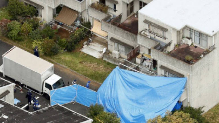 Dad arrested as five kids, wife die in Japan arson, stabbing