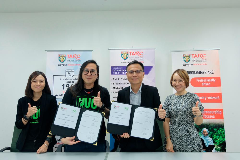From left: Chin, Mark, Sze Wei and Kee at the MoU signing ceremony.