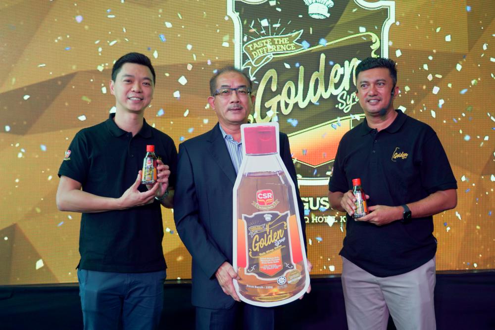 From left: Ng, Bakry and Ahmad Farid at the launch of Golden Syrup. - Amirul Syafiq/TheSun