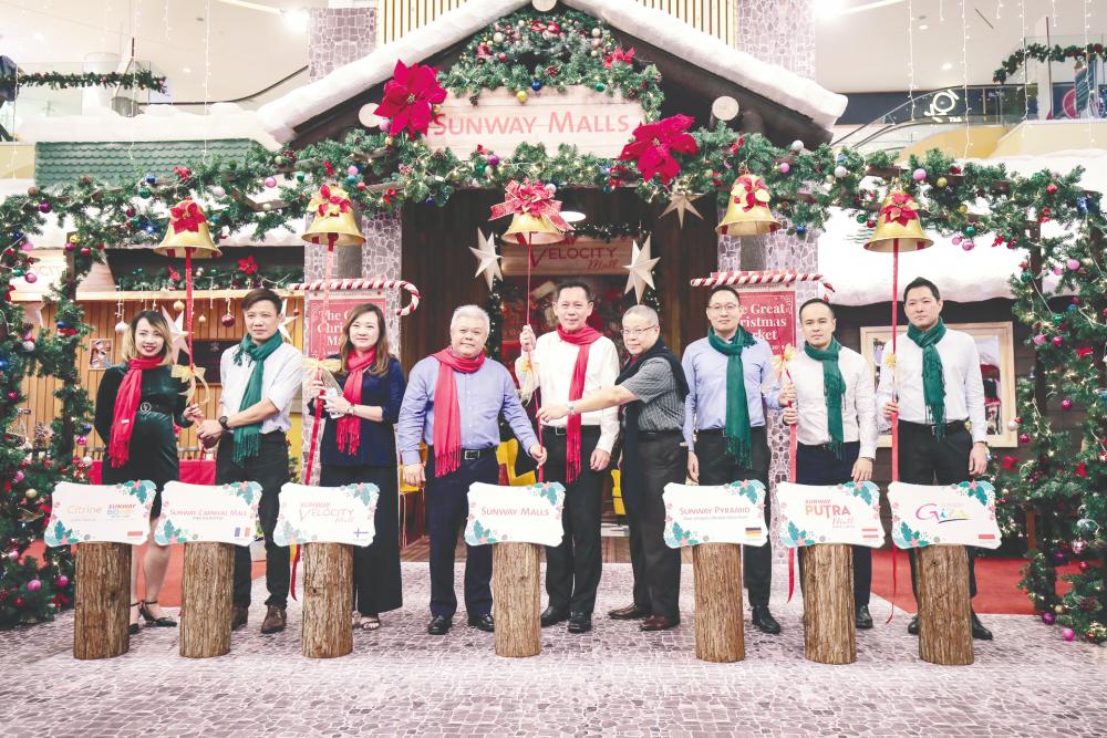 From left: Loo, Chai, Phang, Tan, Chan, Wong, Chin, Lee and Cheok at the launch of this year’s Christmas campaign at the Sunway Velocity Mall in Cheras, Kuala Lumpur. – AMIRUL SYAFIQ/THESUN