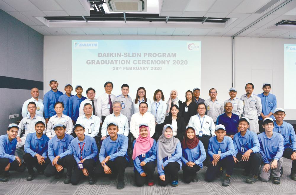 Ready for the future ... Daikin Malaysia apprentices with (second row, from third left) Tan, Ooi, Fang, Lee, Yeow and Chandrasegaran at the graduation ceremony.
