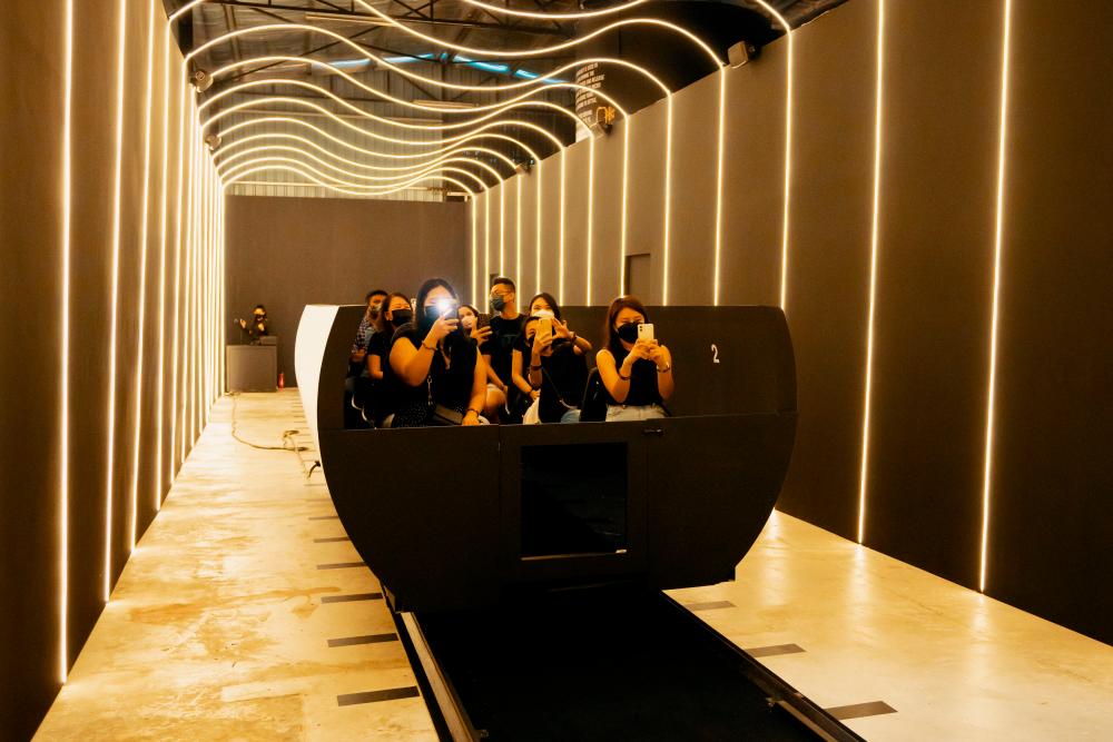 Guests in the shuttle, being transported to the immersive, experiential House of Guinness $!Guests in the shuttle, being transported to the immersive, experiential House of Guinness