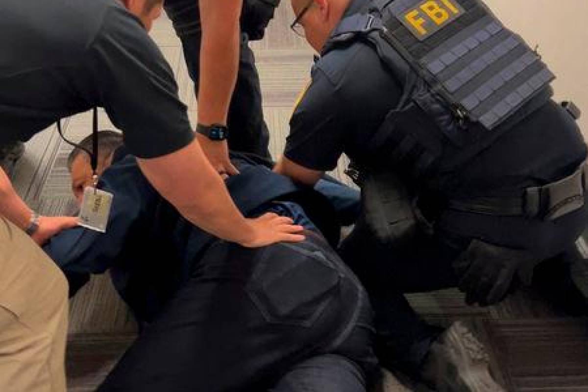 US senator forcibly removed from Trump official’s press conference