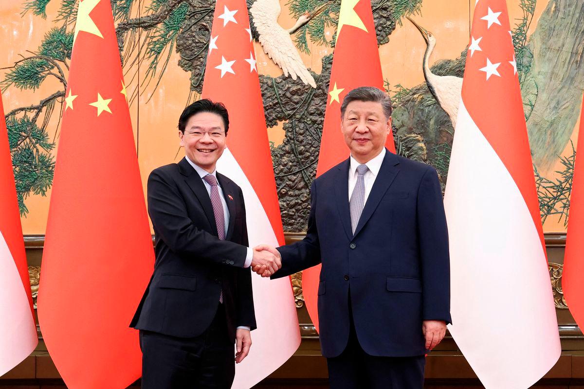 China’s Xi urges Singapore leader to jointly resist ‘hegemony’