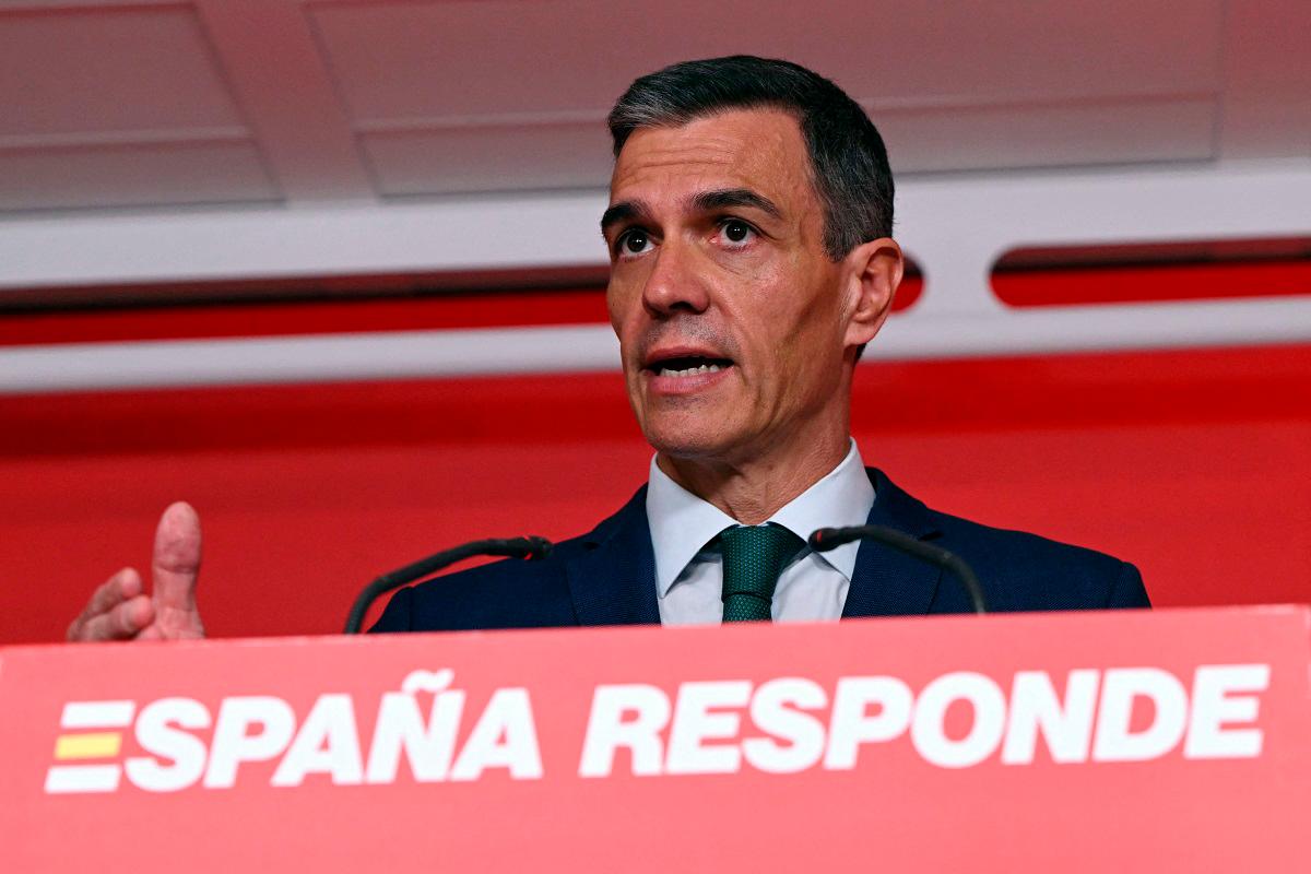 Embattled Spain PM dares opposition to file confidence motion