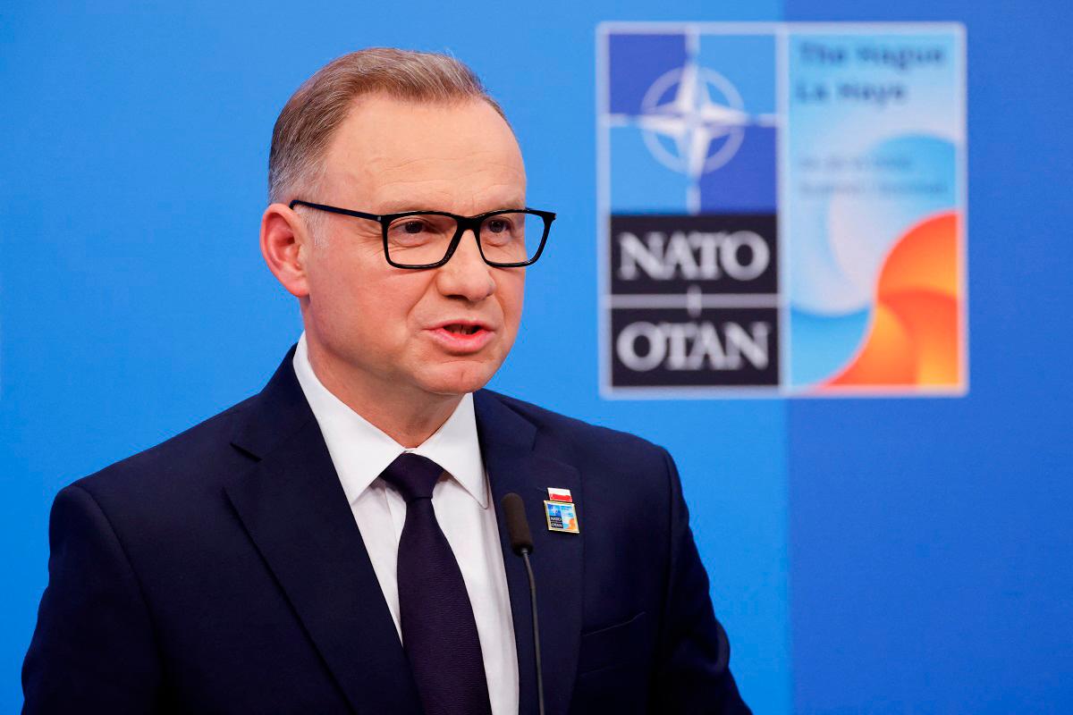Polish president says government trying to force him to sign wind farm laws