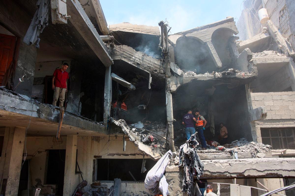 Rescuers say Israeli fire kills at least 27 near Gaza aid point
