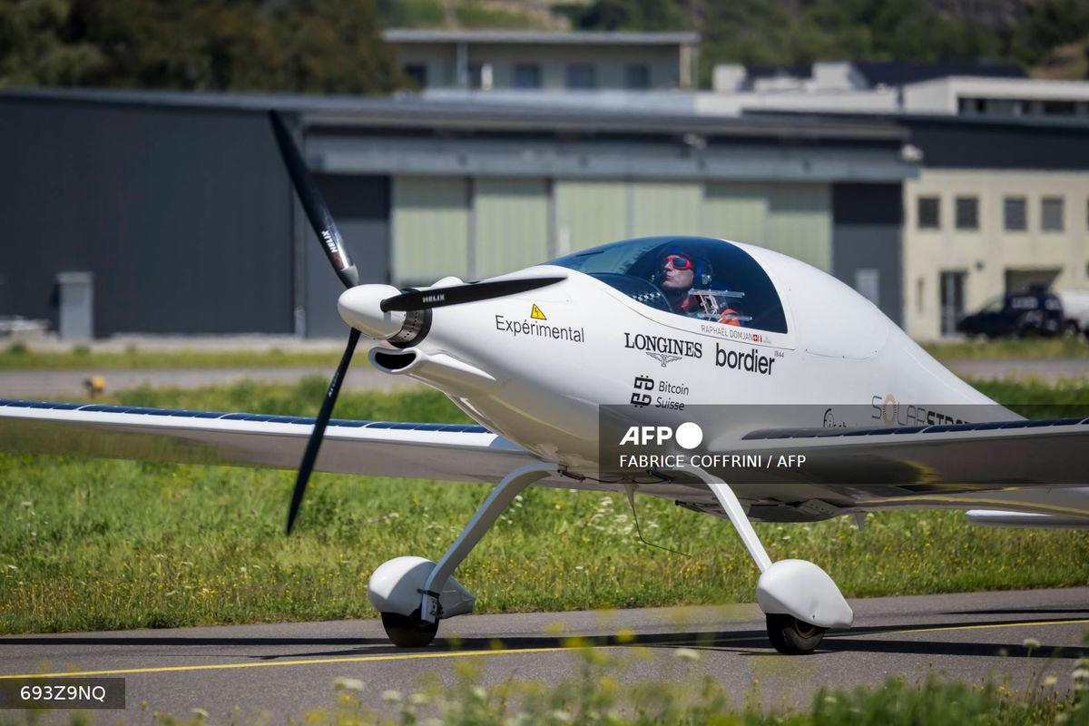 Swiss pilot nears solar plane altitude record with 8,224m flight