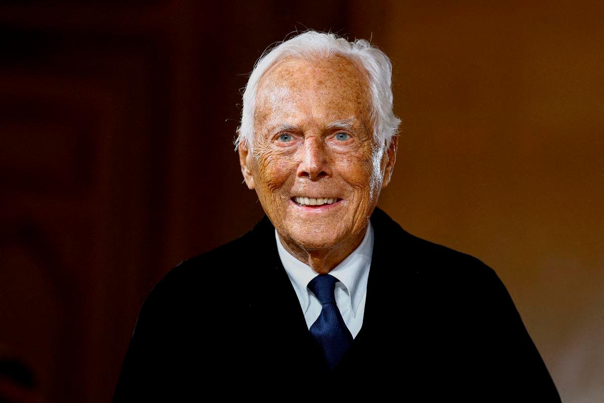 Recovering Giorgio Armani says he will be back in September
