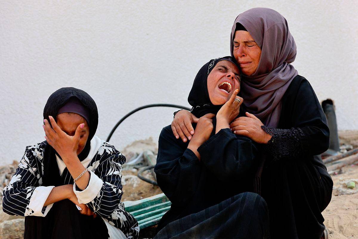 Humanitarian workers killed in Gaza bus ambush, food distribution continues