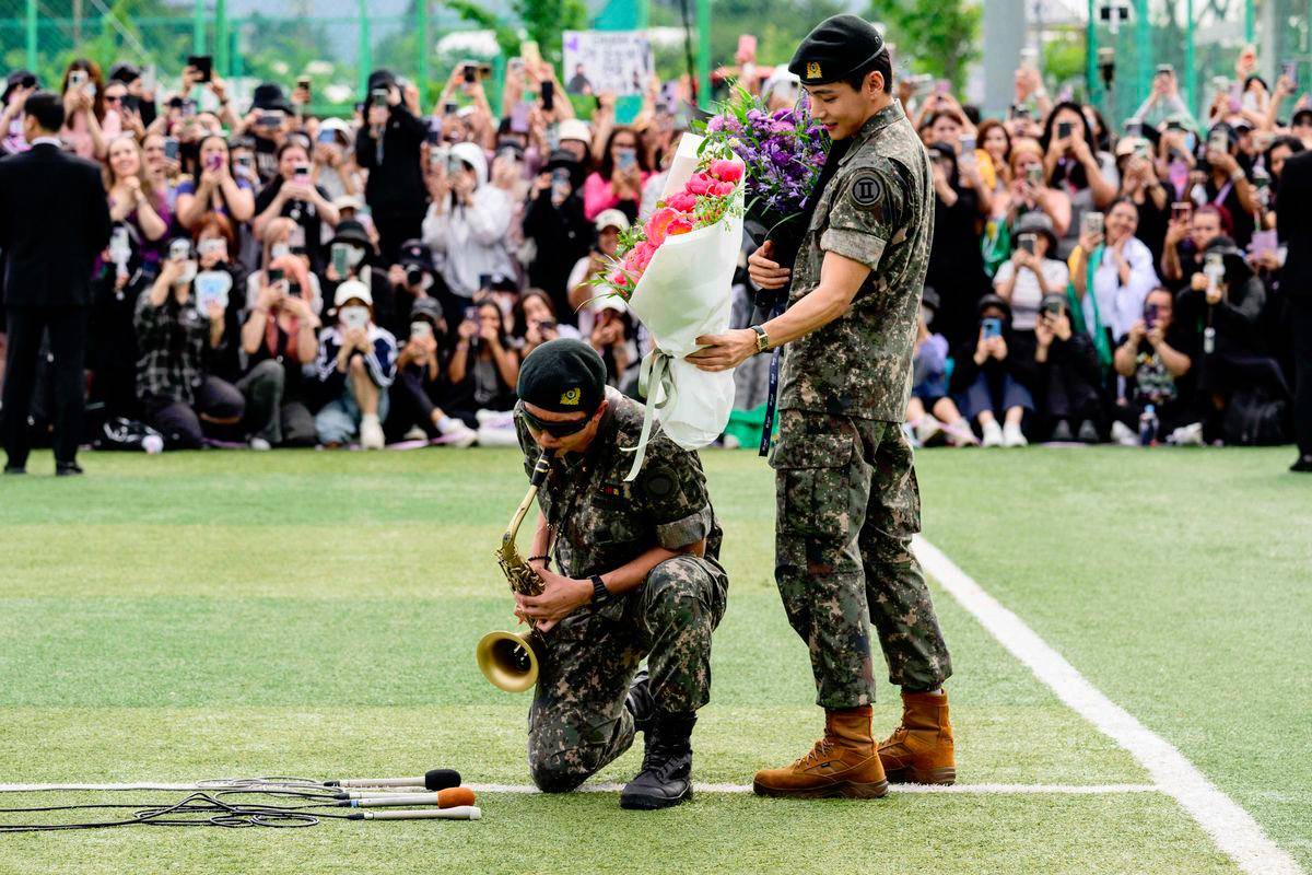 Two BTS megastars released from South Korea military