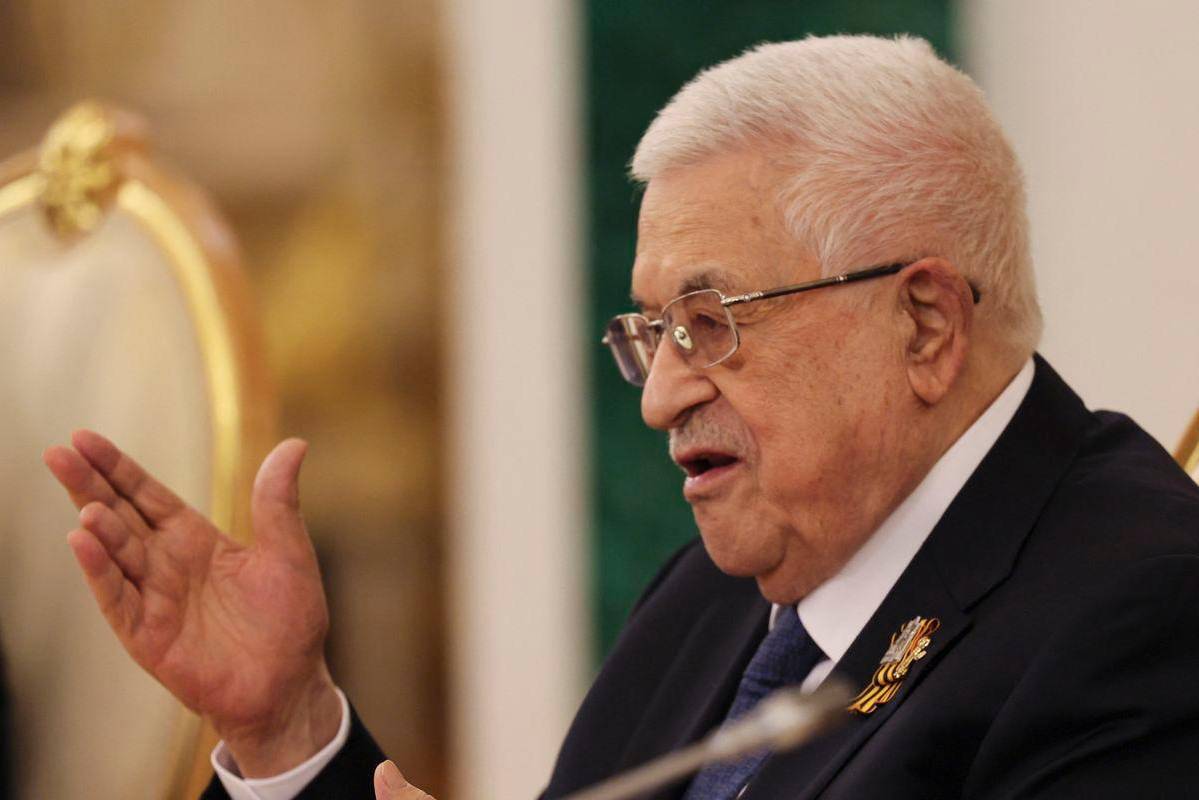 Abbas tells Macron supports demilitarisation of Hamas
