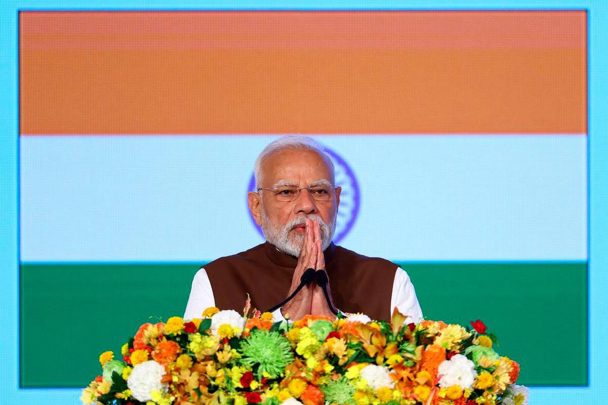 India's Modi says he is committed to progressing ties with China in meeting with Xi