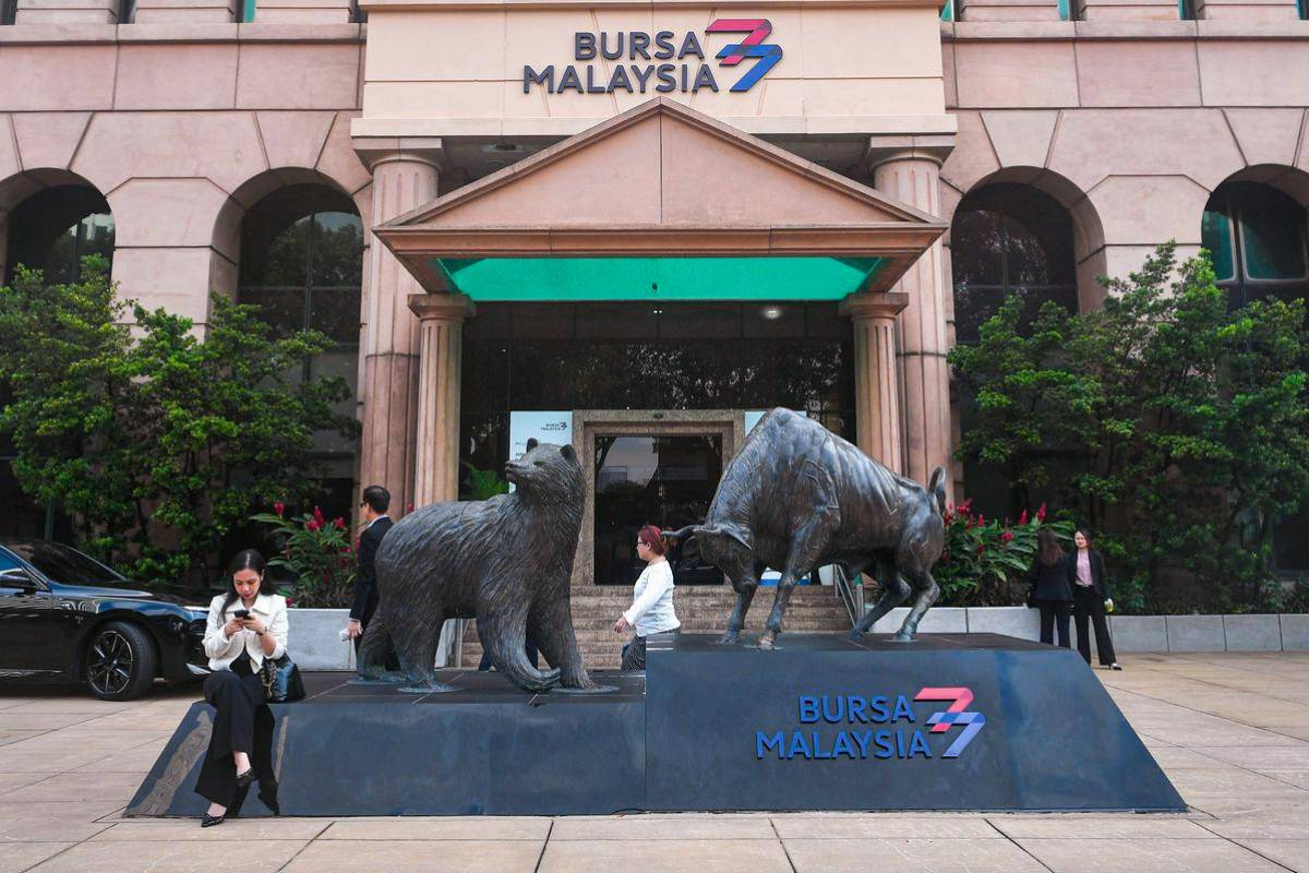 Bursa Malaysia stays lower in mid-afternoon