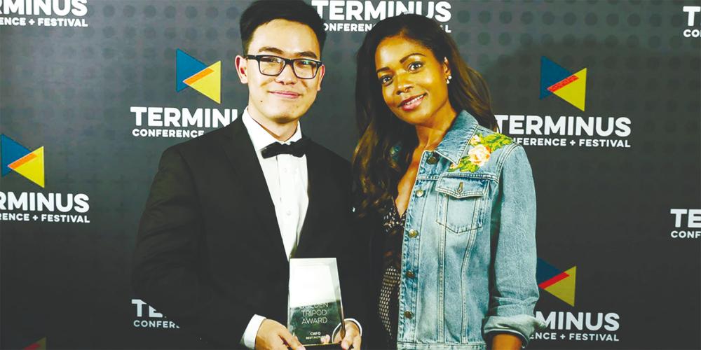 Soon (far left) with actress Naomi Harris after receiving an award for his first film Something Carved and Real at the Terminus Conference + Festival Campus MovieFest in San Francisco.