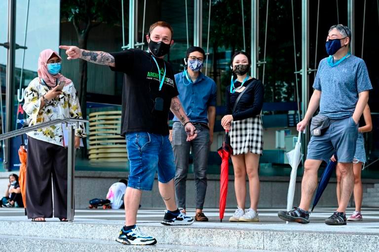 Ex-gang member Bruce Mathieu now helps lead the popular “Triad Trails” tour to fight stereotypes about ex-offenders in Singapore. — AFP