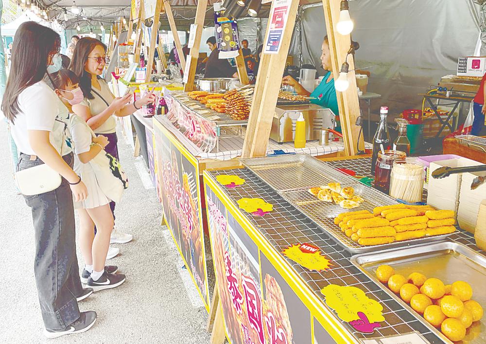 Sharifa Ezat expressed concern over the rise of sweet and junk food vendors at food festivals, where visitors continue to indulge in unhealthy fare despite the high prices. – AMIRUL SYAFIQ THESUN