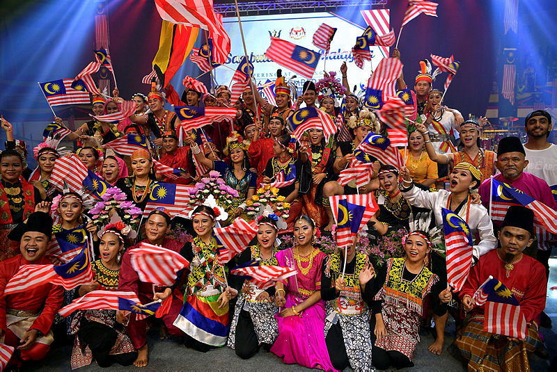 Participants of the Malaysia Day celebrations pose for a photo, at Stadium Perpaduan in Petra Jaya, on Sept 16, 2019