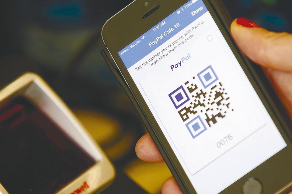 PayPal profit tops estimates on digital payments boom