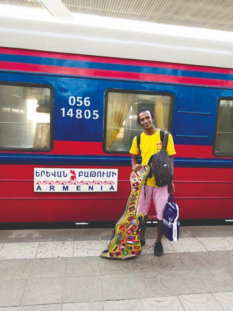 Jeshurun Vincent has been travelling the world using his guitar to spread his message of acceptance and hope. – Courtesy of Jeshurun Vincent