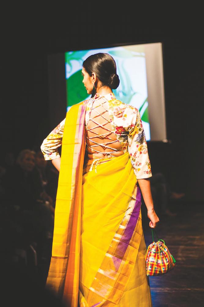 $!Roovaa Lijuan’s designer sarees showcased in a fashion show. – Courtesy of Roova Lijuan