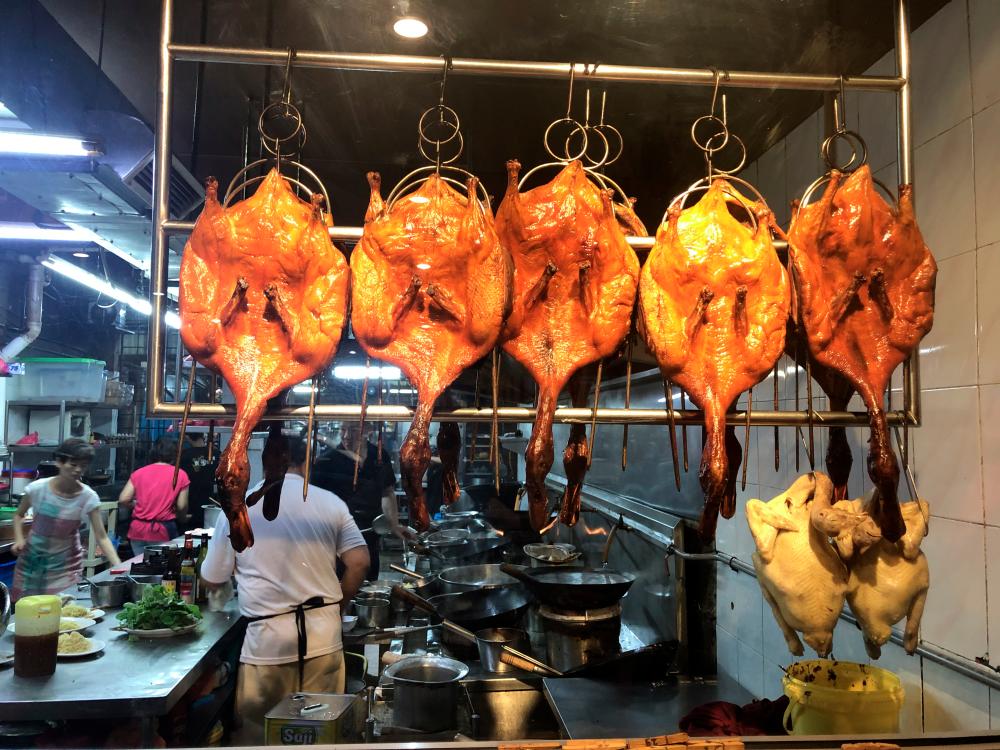 Pipa Duck and poached chicken hanging from the hooks. – PICTURES BY TAN BEE HONG