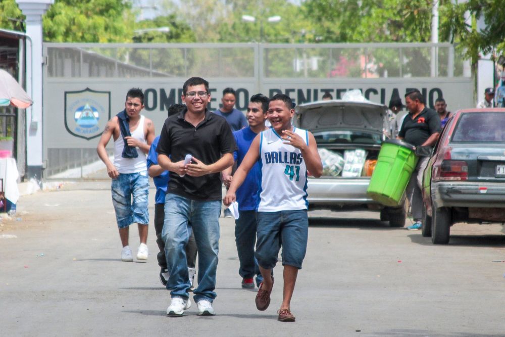 Men walk out of La Modelo maximum security prison in Tipitapa, near Managua, April 16, 2019. — AFP