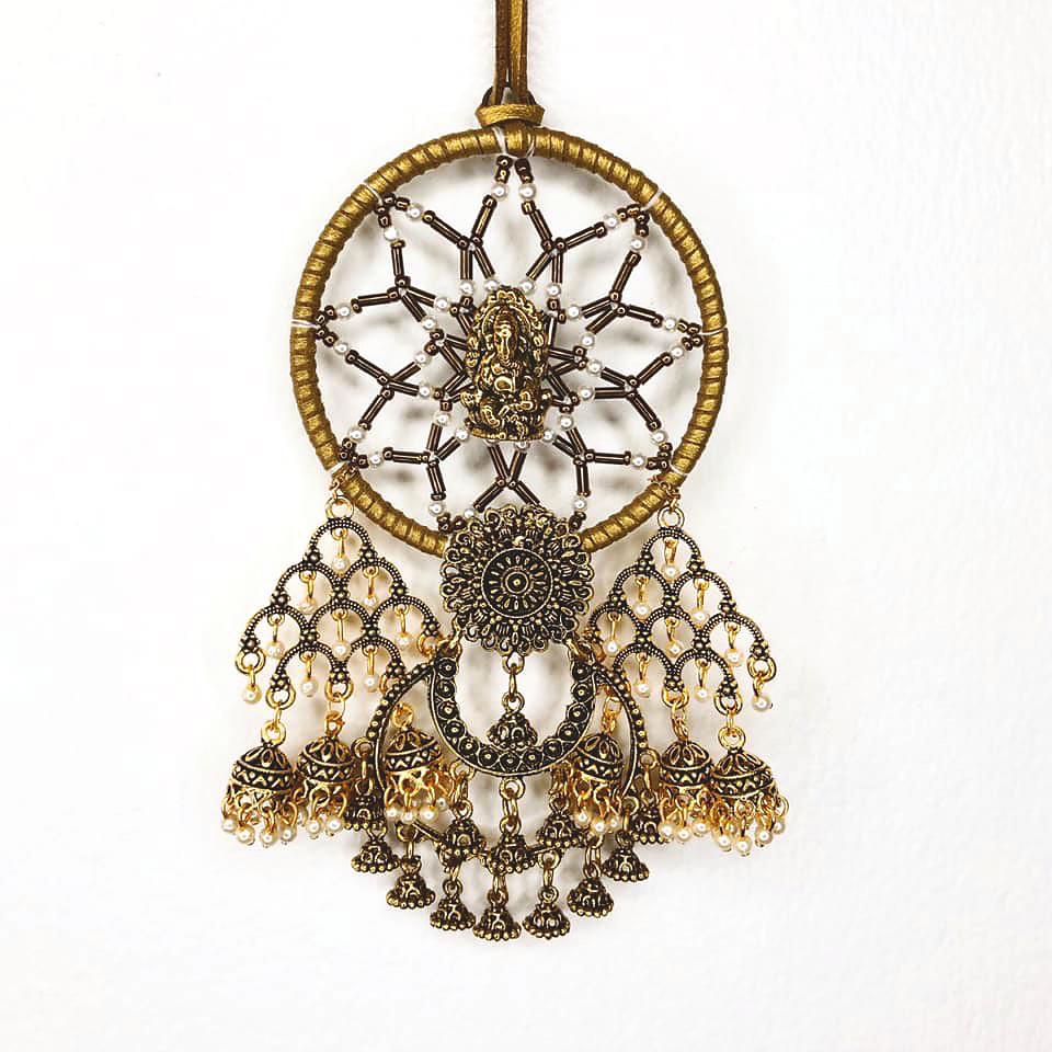 $!The dreamcatcher is a popular design for her earrings. – Deeper Than Fashion