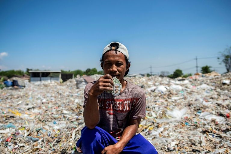 Residents in the Indonesian town of Bangun are basking in a waste-picking boom, as levels of imported trash soar. — AFP