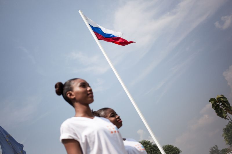 The Russian flag flies over a stadium in Bangui: Russia was fiercely critical of the French approach to negotiating renewal of the UN peacekeeping mission in the Central African Republic. — AFP
