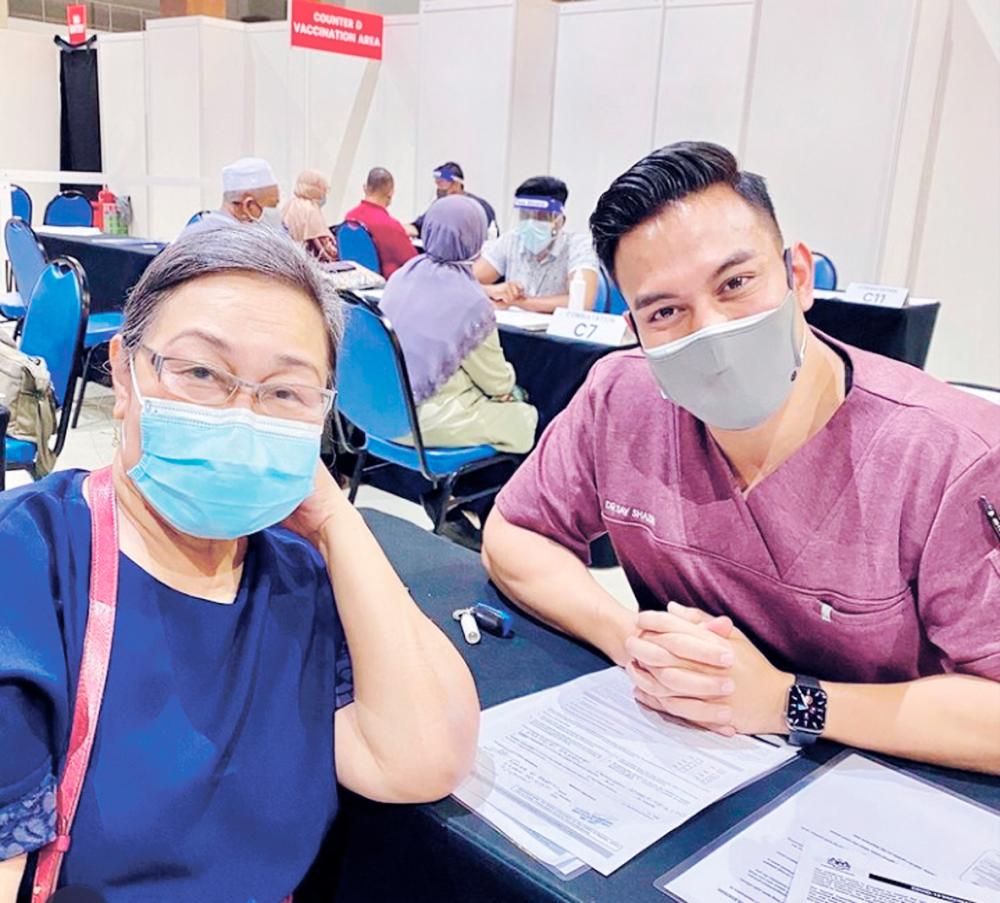 Dr Say also helps out as a volunteer at the vaccination centre in Putra World Trade Centre Kuala Lumpur.