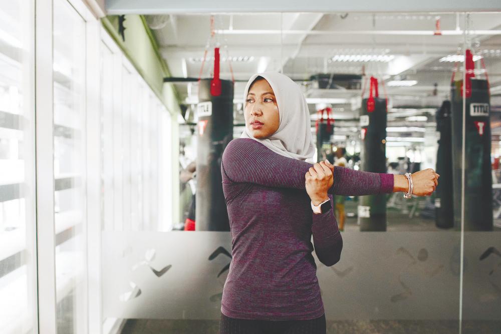 Fitness instructor Ain Ramli has been changing people’s gender and cultural stereotypes with her passion for physical training. – Courtesy of Ain Ramli