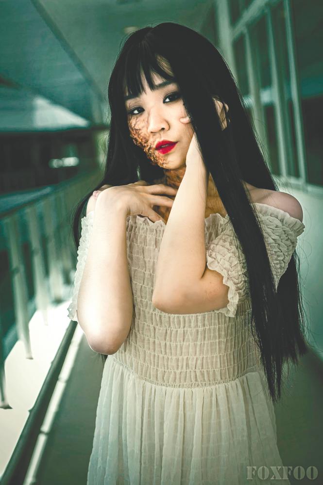 $!Abigail Goh cosplaying as Japanese horror icon Tomie. – Courtesy of Foxfoo Photography