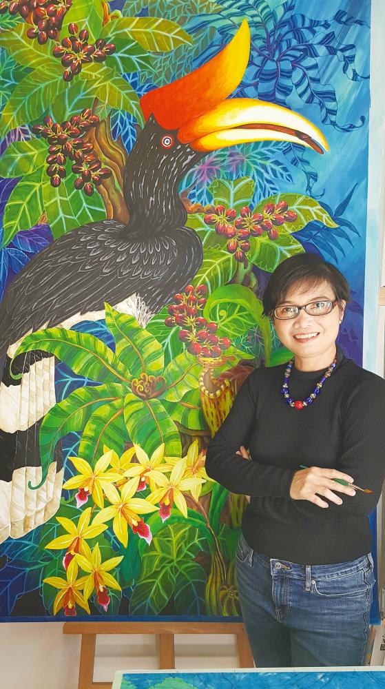 Narong with an artwork titled Manuk Tikuang. $!Narong with an artwork titled Manuk Tikuang.