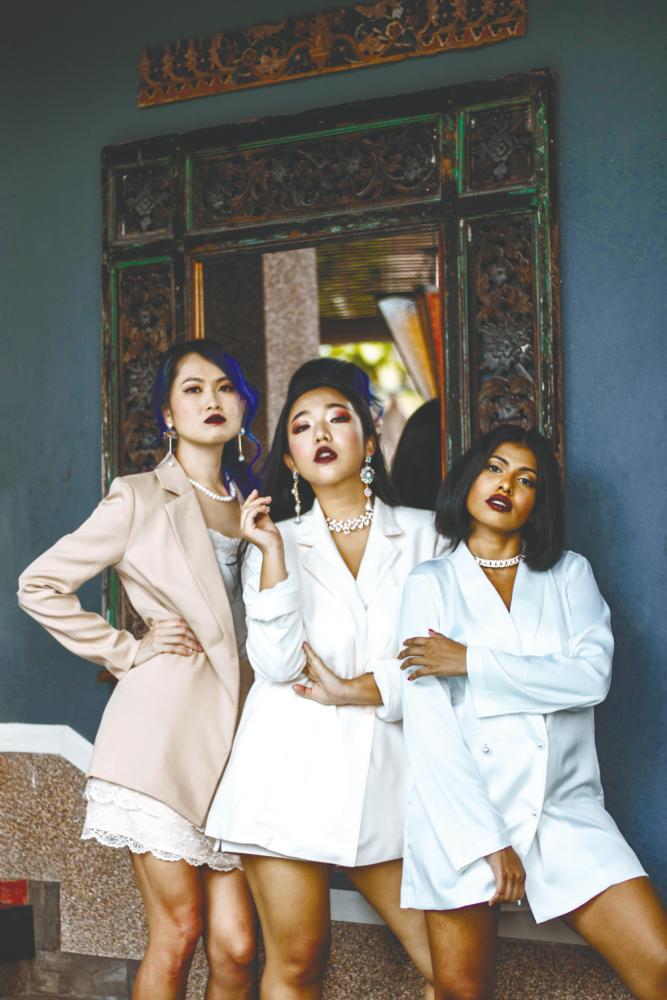 (from left) Siew, Sachie and Alesia front Tiga Soul. – Courtesy of Tiga Soul