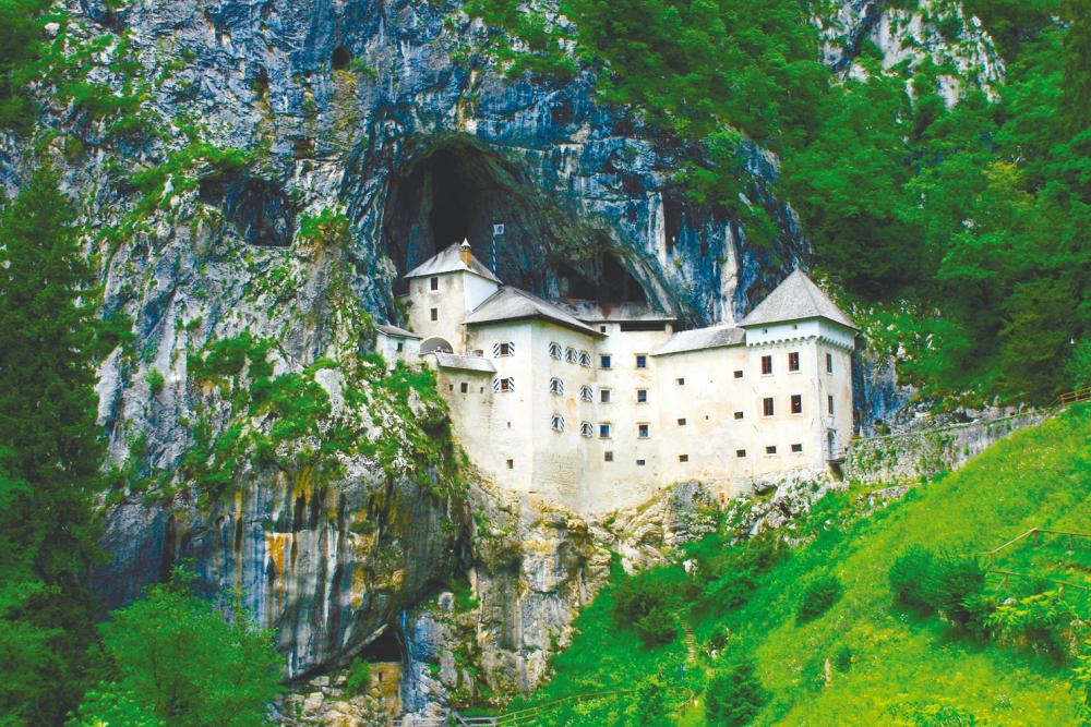 $!The beautiful Predjama Castle was once the site of horrible tortures and executions. – lonelyplanet