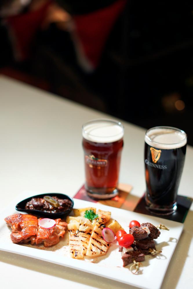 Lavo signature meat platter paired with Kilkenny and Guinness.