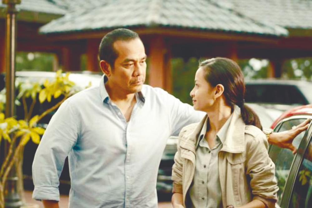 $!Sharifah Amani in a scene from ‘Motif’ (2019), with Rosyam Nor. – WayangWorks