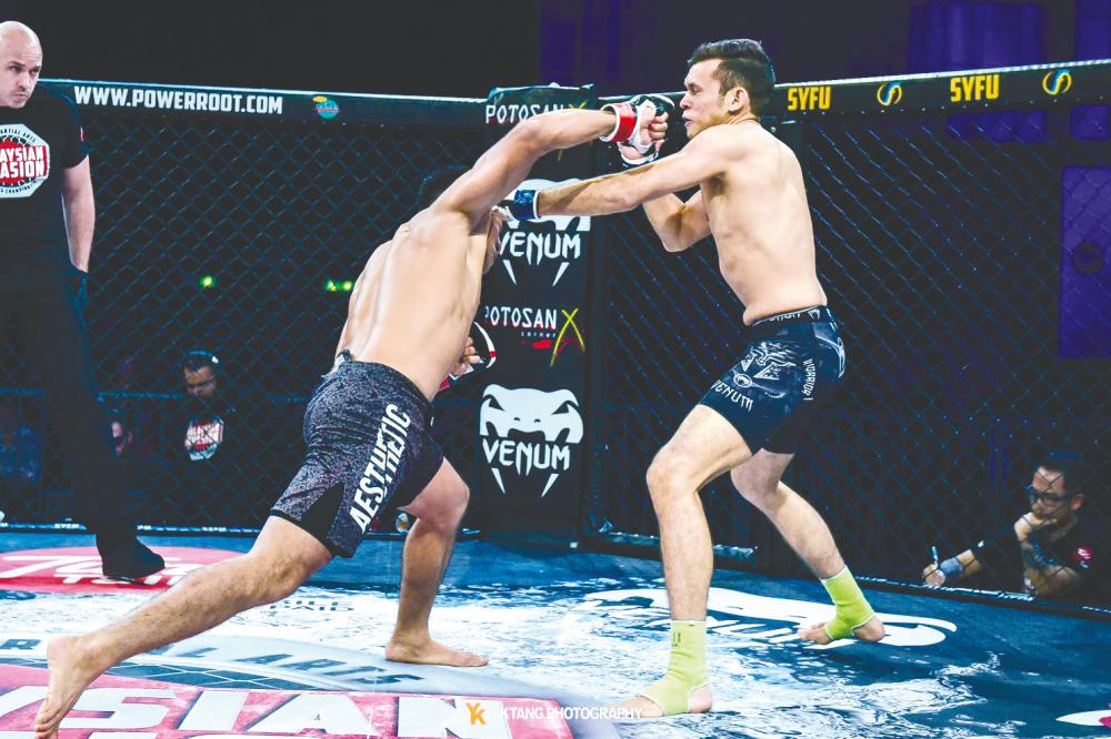 Soo in action in the ring during his days as an MMA fighter. – Courtesy of YK Tang Photography $!Soo in action in the ring during his days as an MMA fighter. – Courtesy of YK Tang Photography