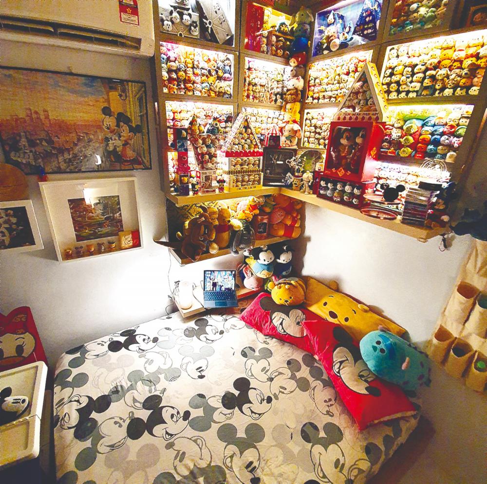 Tan built display shelves in his home to showcase his Disney collectibles from his travels and searches over the years. – Courtesy of Daryl Tan $!Tan built display shelves in his home to showcase his Disney collectibles from his travels and searches over the years. – Courtesy of Daryl Tan