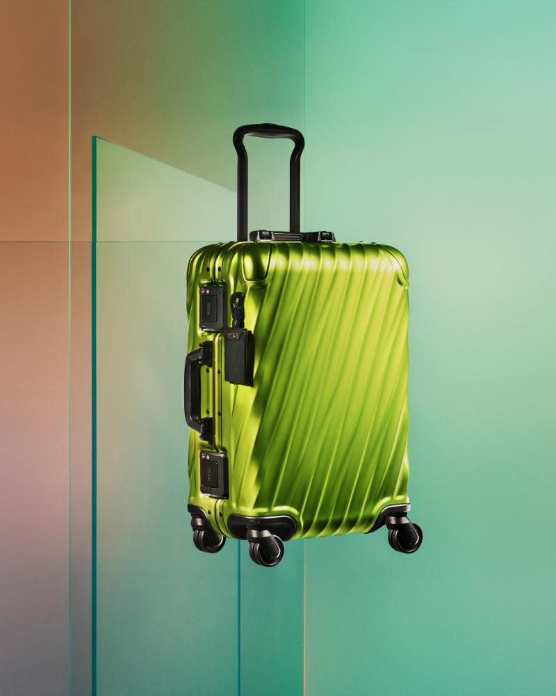 Lime green luggage. – TUMI