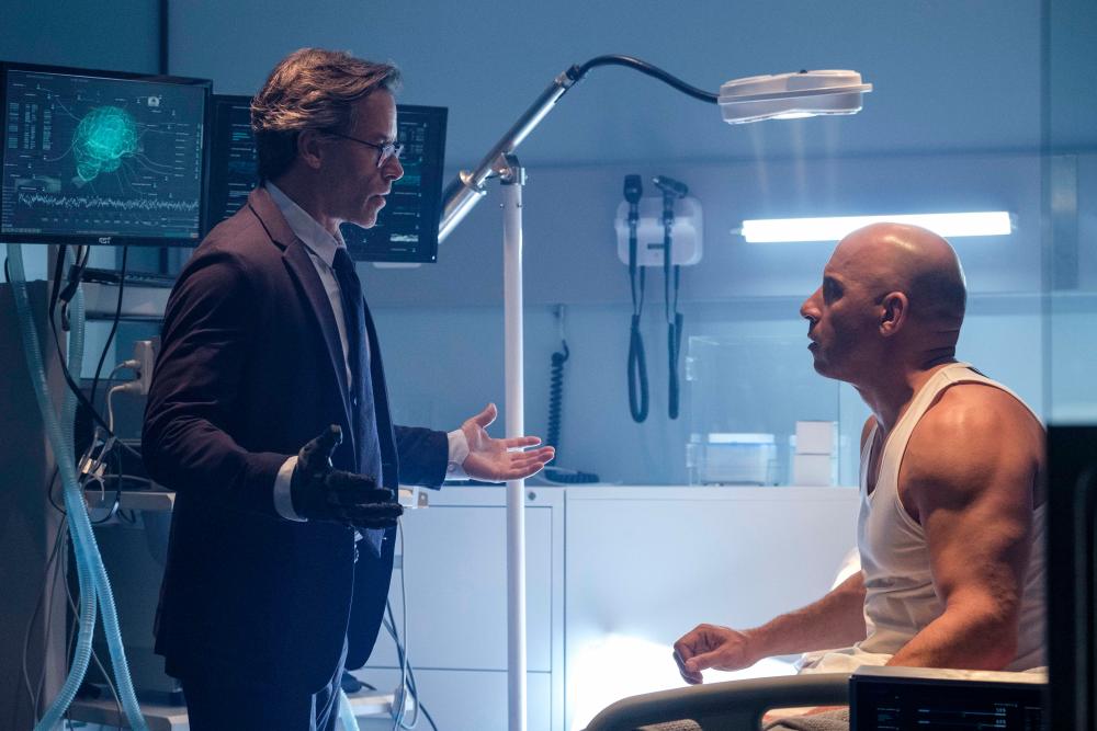 Dr. Emil Harting (Guy Pearce) and Ray Garrison (Vin Diesel) in the RST Lab in Columbia Pictures’ Bloodshot.