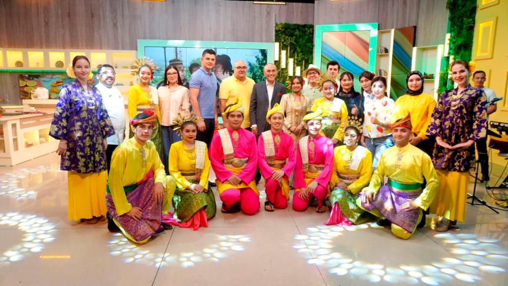 MSU Performing Arts and Culture Club (PACC) with MSU President, Prof Tan Sri Dr Mohd Shukri (7th from left, standing) after cultural performing in one of the local media studios in Uzbekistan.