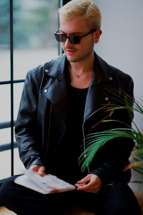 Add a streak of toughness with a leather jacket. – PEXELS