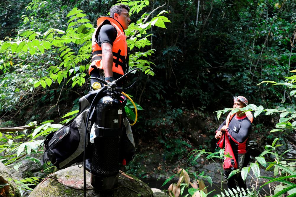 Members of the rescue team take part in a search and rescue operation for 15-year-old Irish girl Nora Anne Quoirin who went missing from a resort in Seremban, Malaysia, Aug 7, 2019. — Reuters