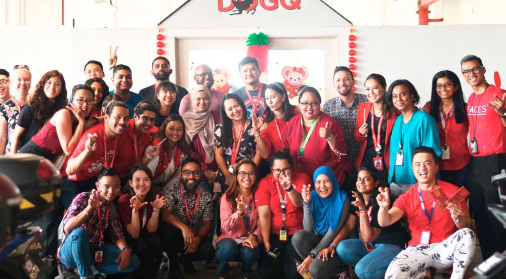 Bottom row, third from left: AirAsia Malaysia CEO Riad Asmat and AirAsia X Malaysia CEO Benyamin Ismail (top row, eighth from left) with the AirAsia Allstars that came for the DogQ Open House.